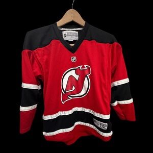 Vintage CCM rbk NHL Martin brodeur Youth Jersey - Red and Black size l/xl
